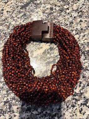 Patricia Von Musulin 
Multi strand faceted tiger’s eye necklace